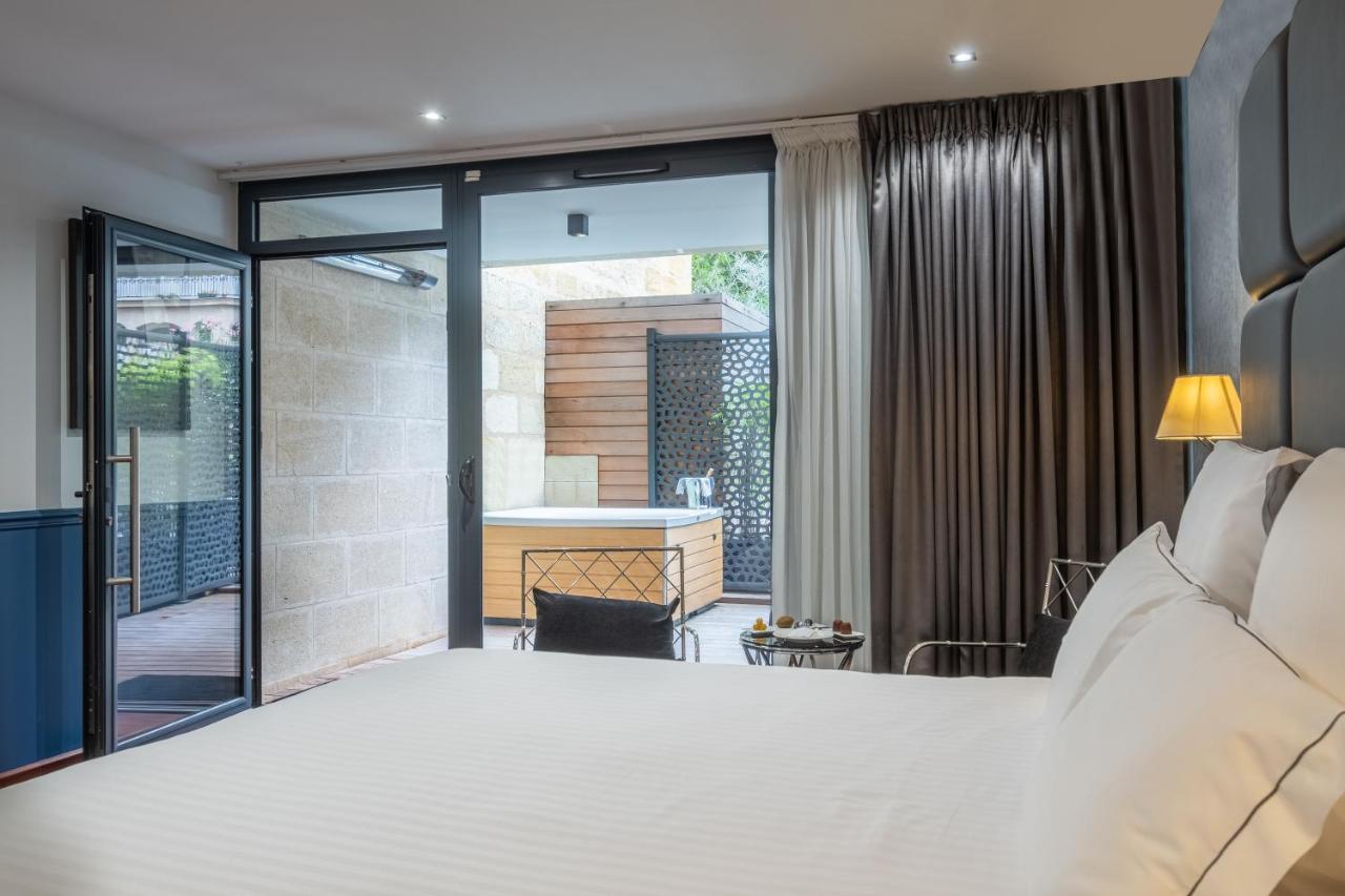 Le Palais Gallien Hotel & Spa Bordeaux Exterior photo A room at the hotel