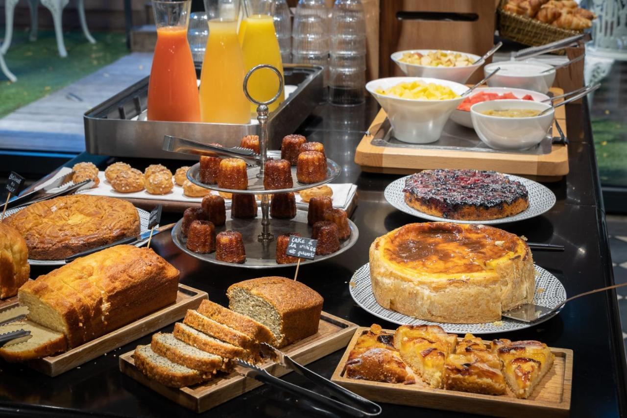 Le Palais Gallien Hotel & Spa Bordeaux Exterior photo A selection of cakes and pastries